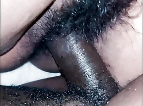 Hairy drenched pussy enjoying a black dick