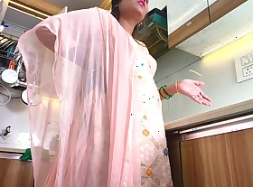 Desi stepmother hindi real sexual intercourse with stepson in kitchen and she got unselfish Cumload in  black pussy.