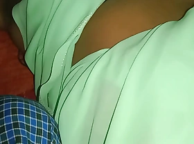 My neighbor's aunt was spectacular in a saree on the bed. I gently rubbed her breasts and shared them on the bed.